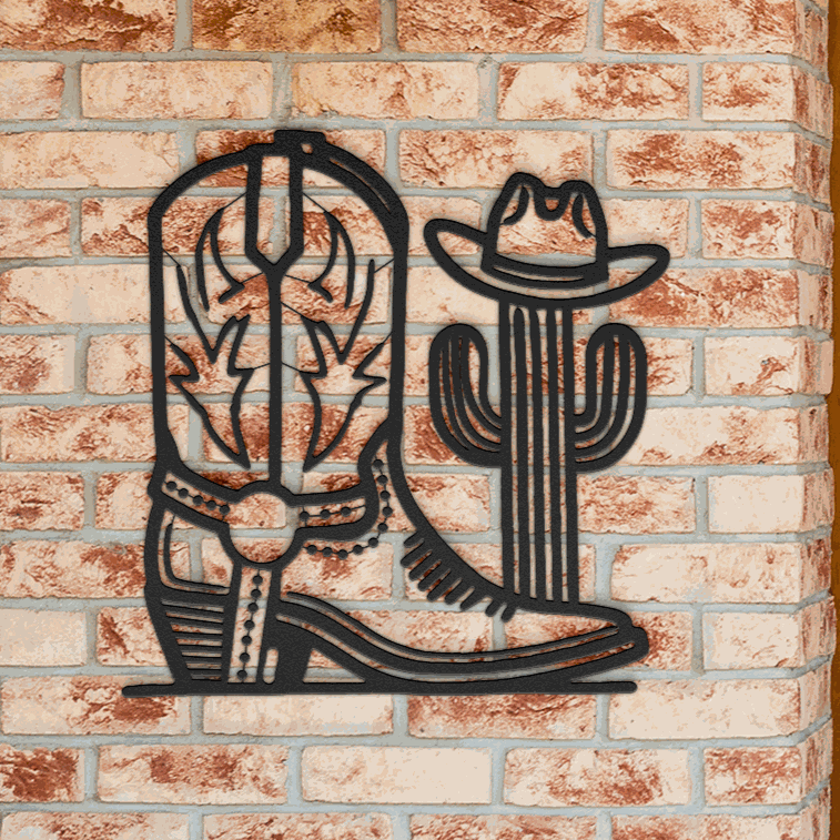 Metal wall art featuring a cowboy boot and cactus design cut from 18-gauge steel, perfect for western and rustic decor.