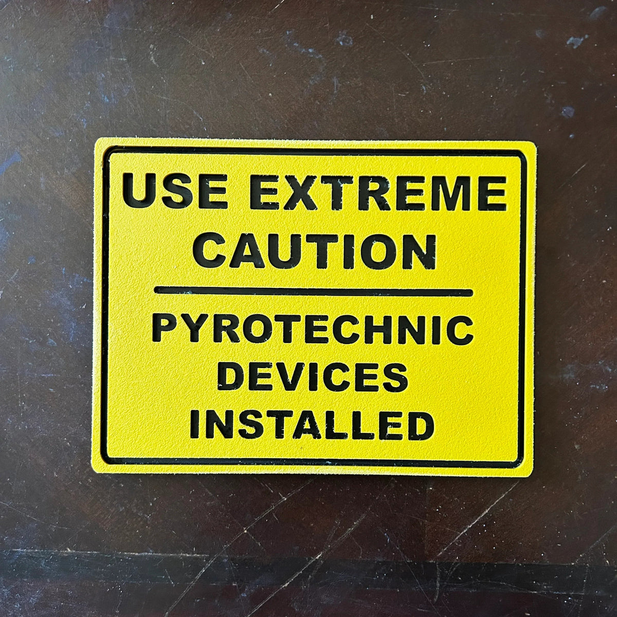 Pyrotechnic Devices Wall Sign bold industrial warning in durable weatherproof plastic