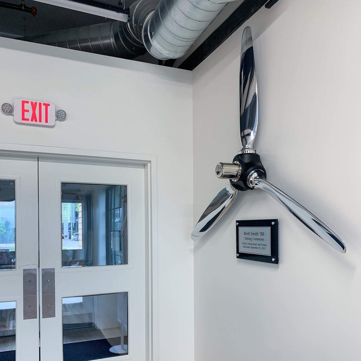 High polished 3-bladed McCauley aluminum metal airplane propeller wall sculpture with black hub and chrome finish