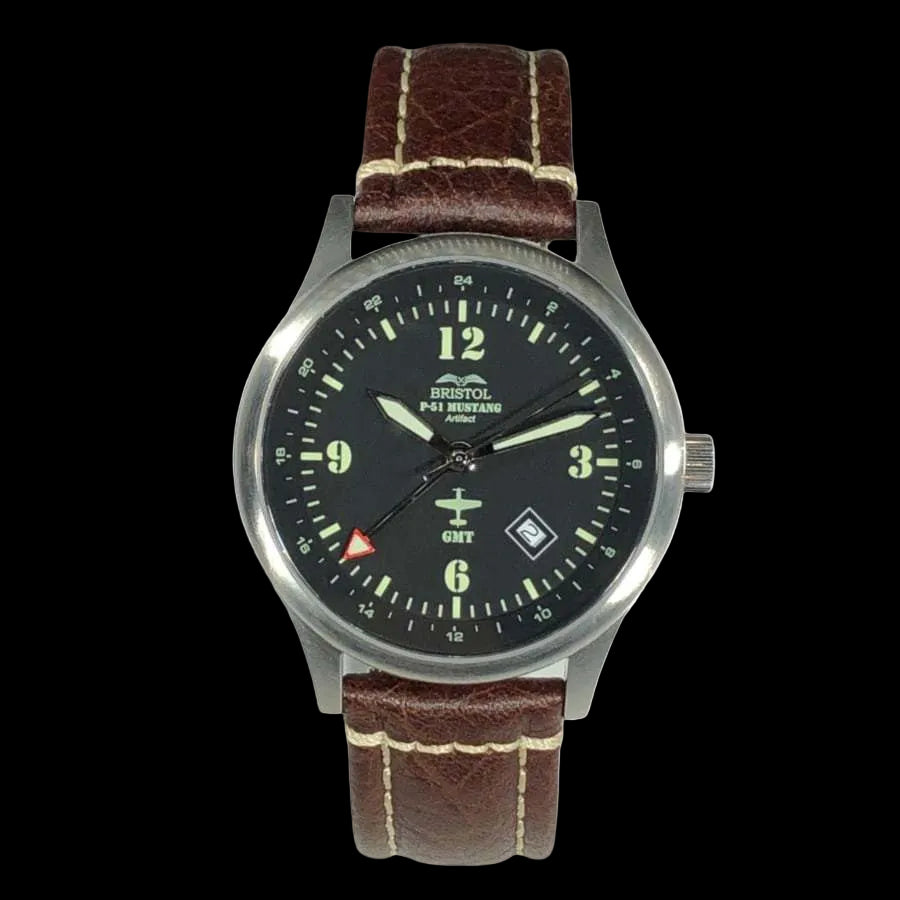 P-51 Mustang Tribute watch with stainless steel brushed case, brown leather strap, and black dial featuring Swiss quartz movement and WWII aircraft artifact back