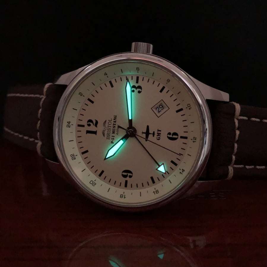 P-51 Mustang Tribute watch with polished stainless steel case, beige dial, and brown leather band