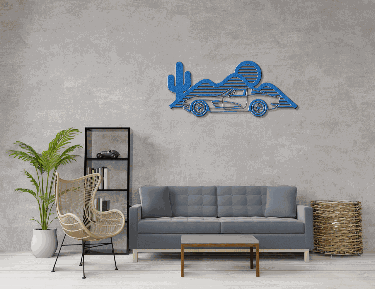 Blue Corvette silhouette metal wall art mounted above a gray sofa in a modern living room with neutral decor
