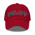Stylish red pilot hat with embroidered "PILOT" text and adjustable strap
