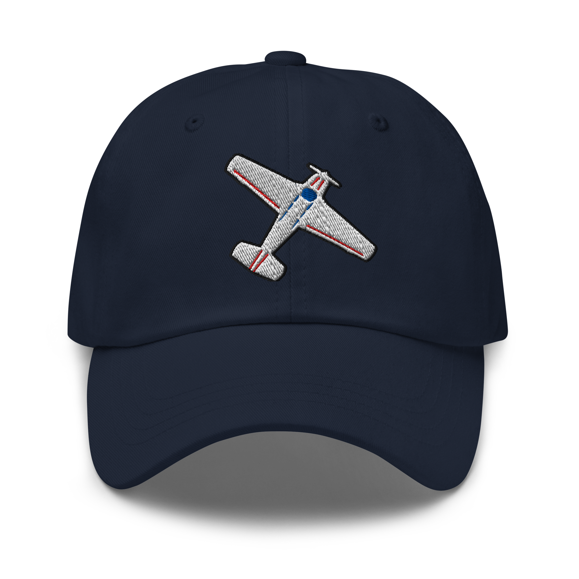 A navy blue baseball cap featuring an embroidered airplane motif on the front panel. The airplane design is detailed with a textured silver body, red stripes, and a blue nose section.