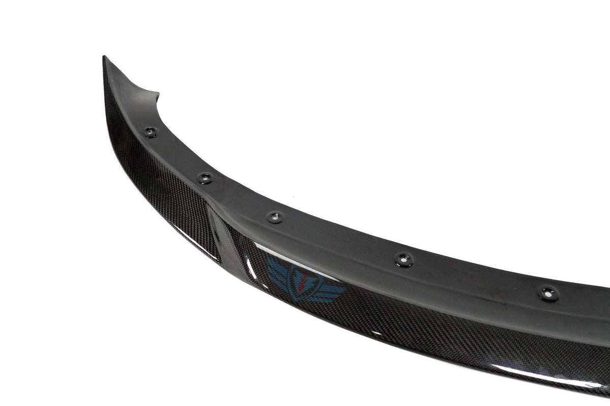 Green wrapped Tesla Model 3 with FYBR ATS style genuine carbon fiber front lip installed