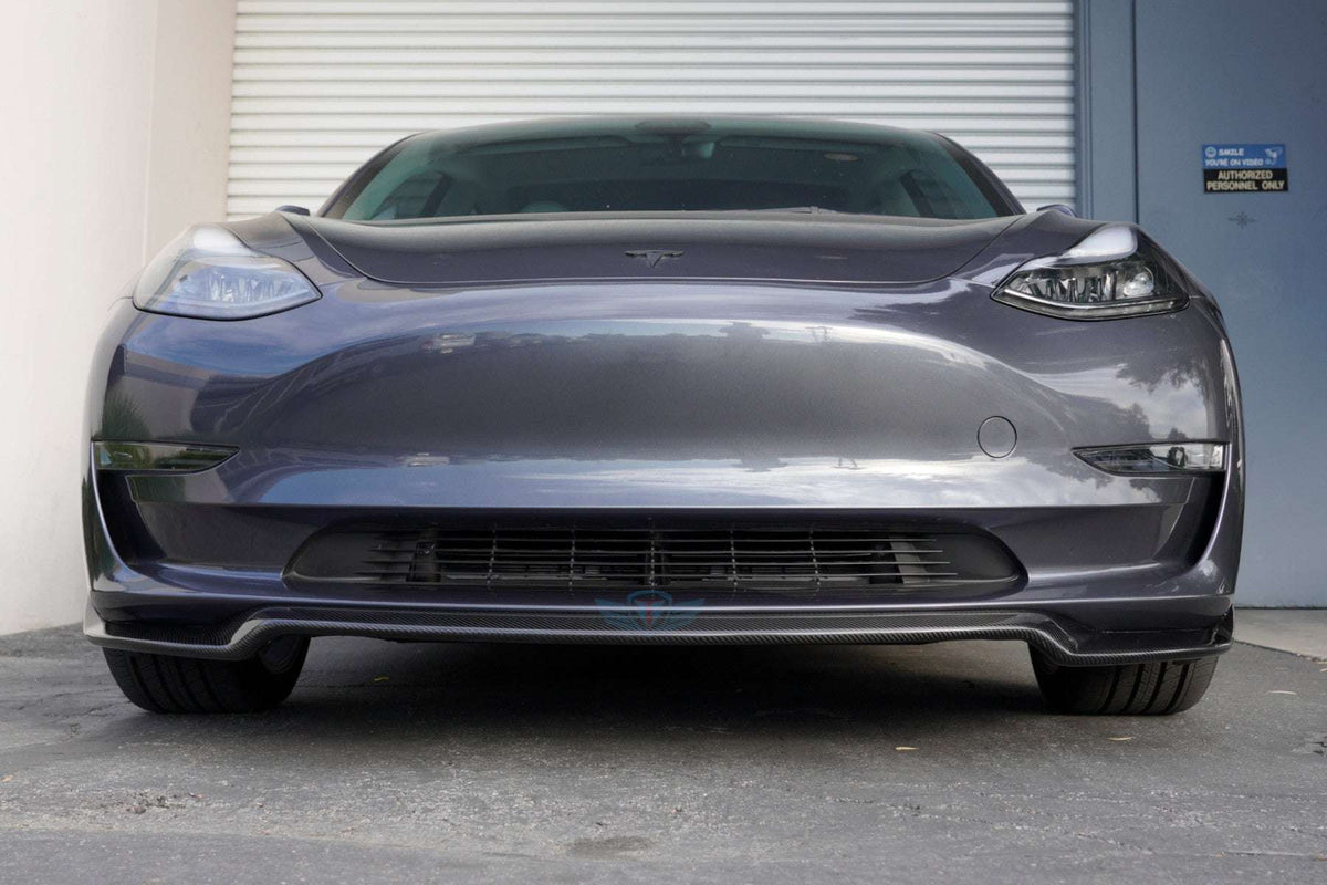 Tesla Model 3 with FYBR ATS style genuine carbon fiber front lip in green wrap
