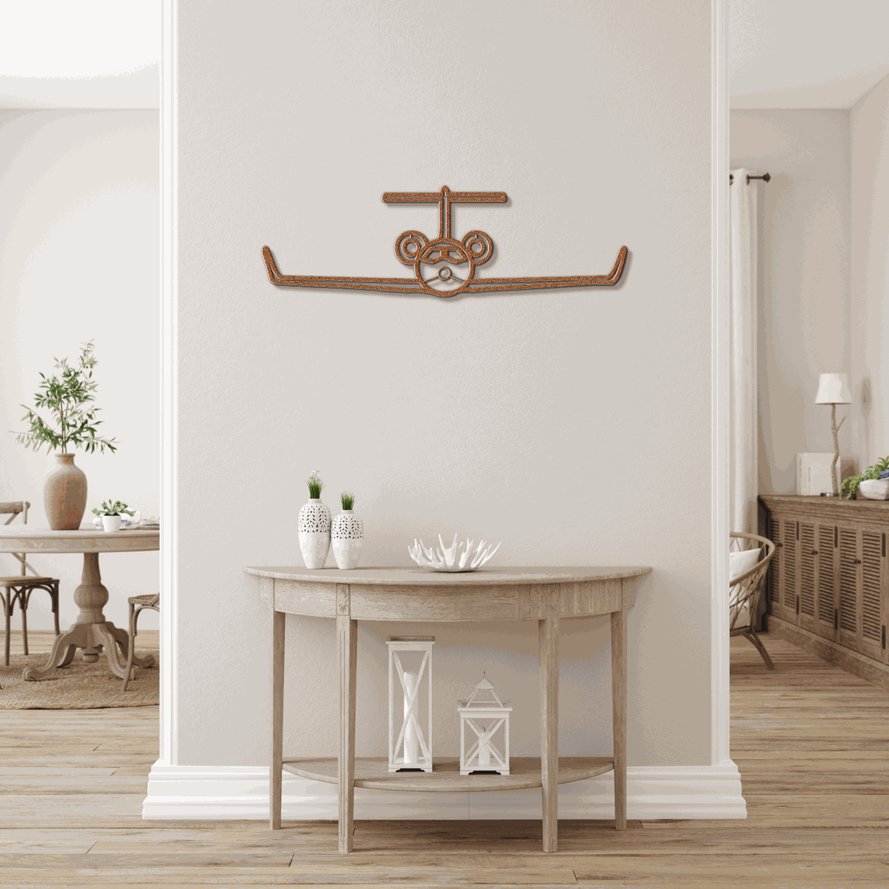 Metal wall art steel aviation silhouette mounted above wooden console table in modern living room.