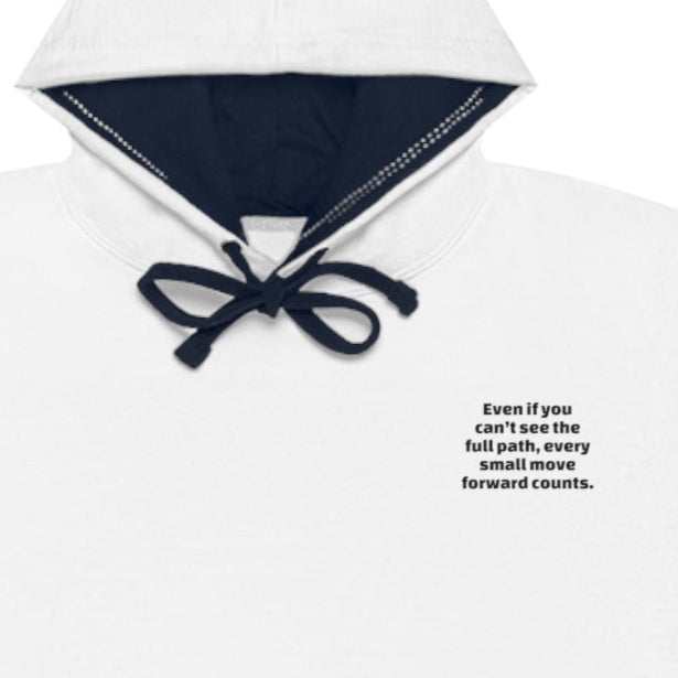 White inspirational motivational varsity hoodie with navy blue contrast hood and motivational text on chest