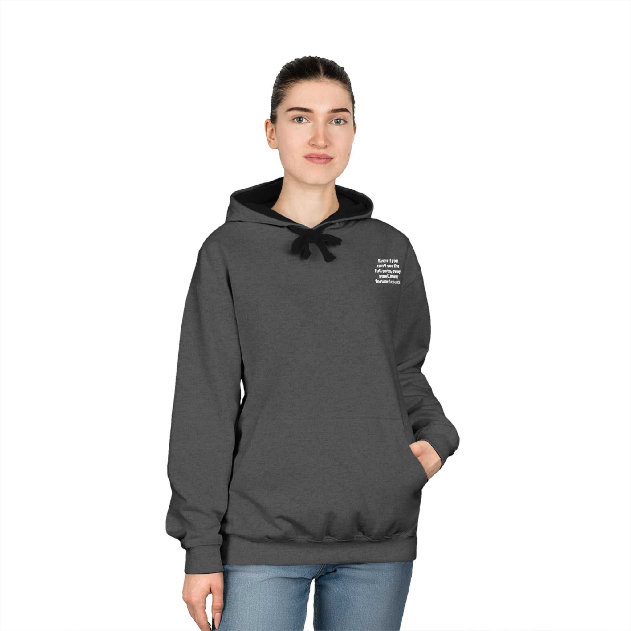 Woman wearing dark gray Inspirational Motivational Varsity Hoodie with contrast hood and kangaroo pocket