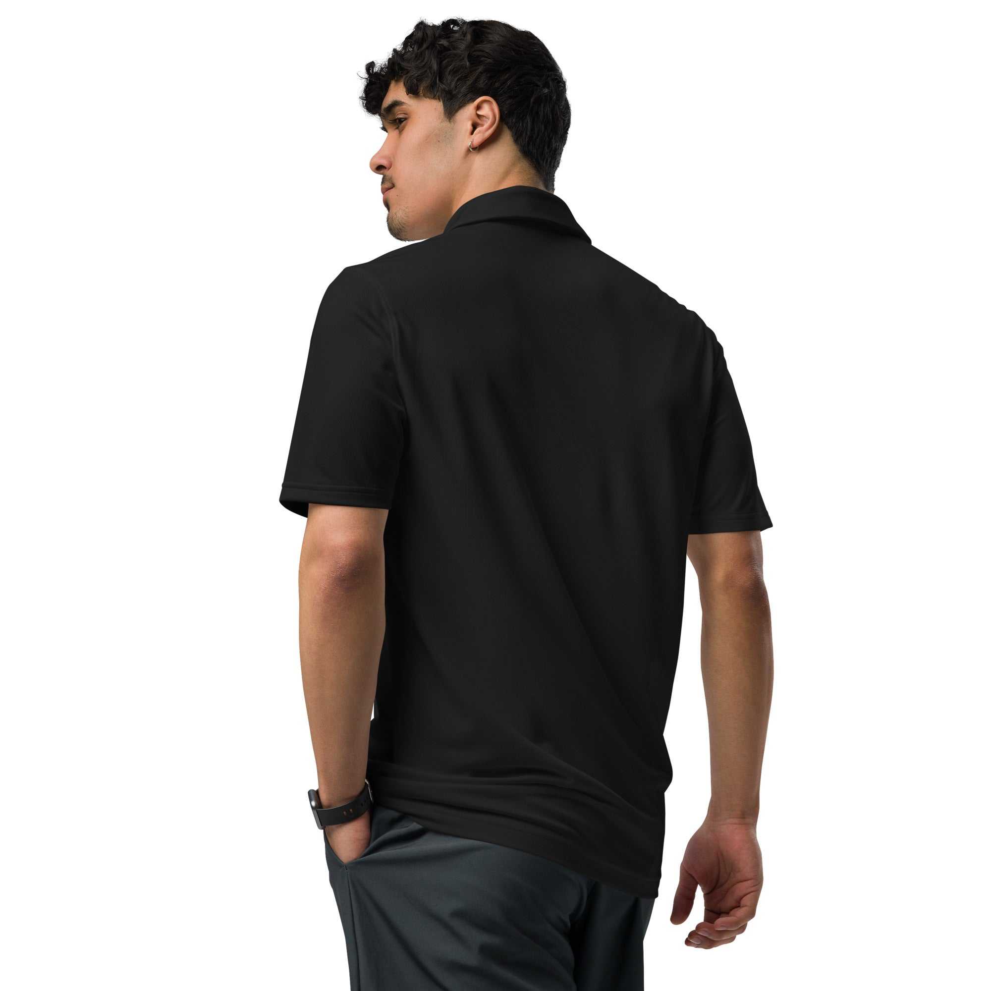 Man wearing black pilot polo shirt with embroidered private jet logo on back, performance fit golf and travel shirt