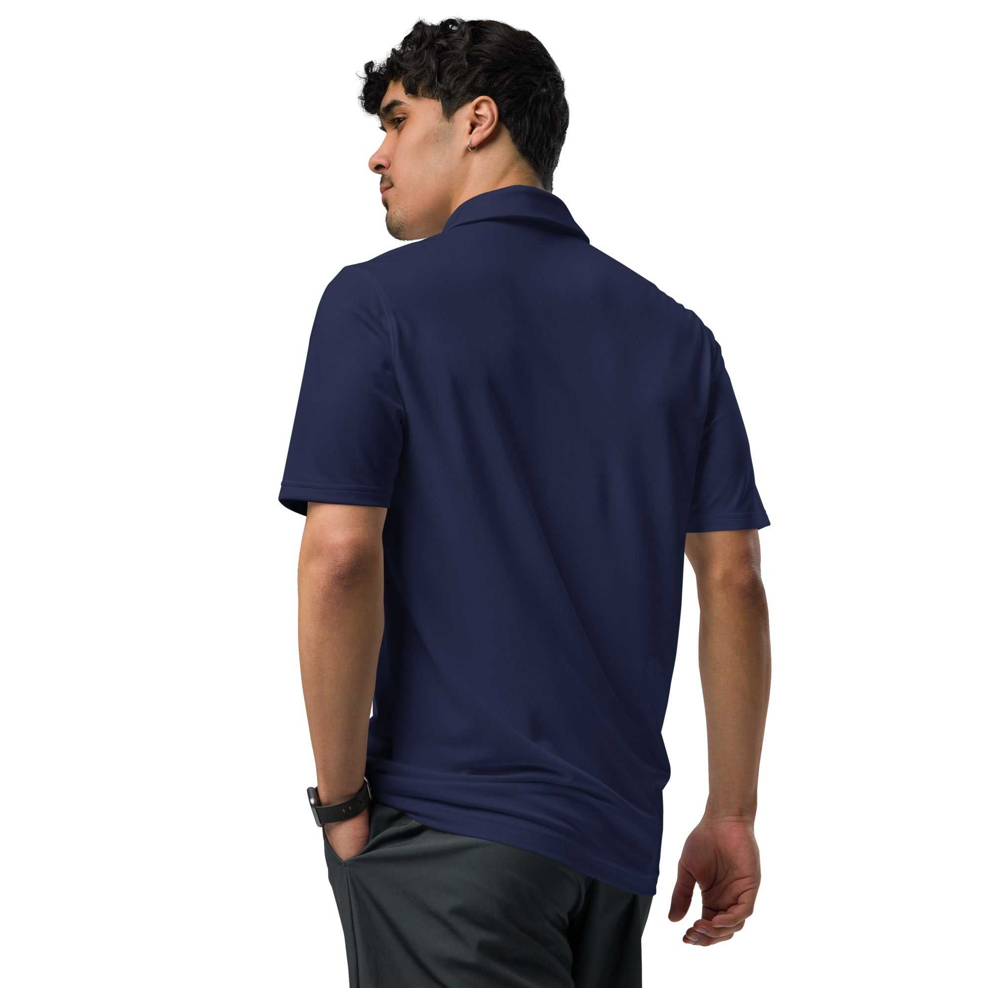 Man wearing navy pilot polo shirt with embroidered private jet logo on chest, short sleeve, performance fit, breathable fabric