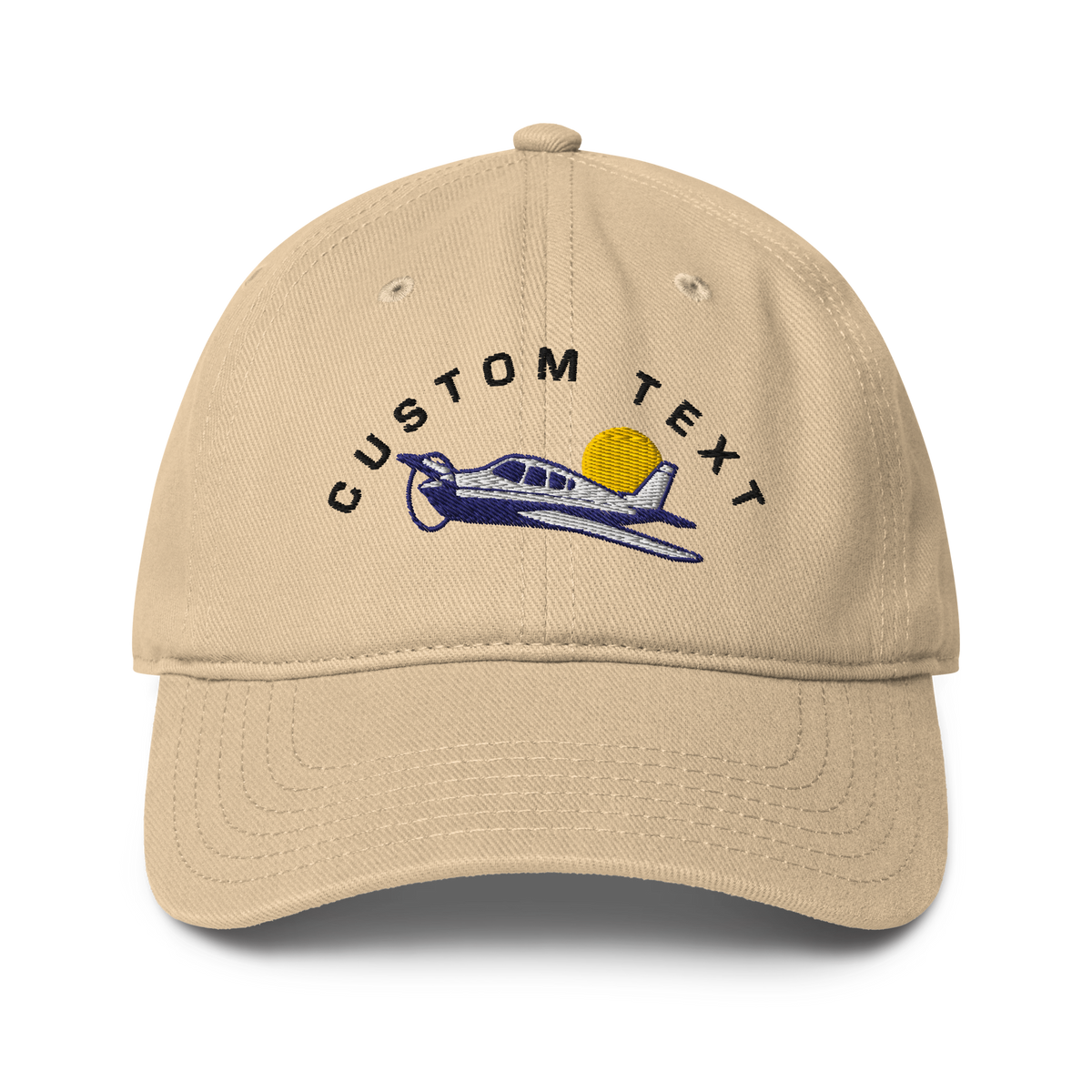 Beige cap with airplane and sun design on a white background