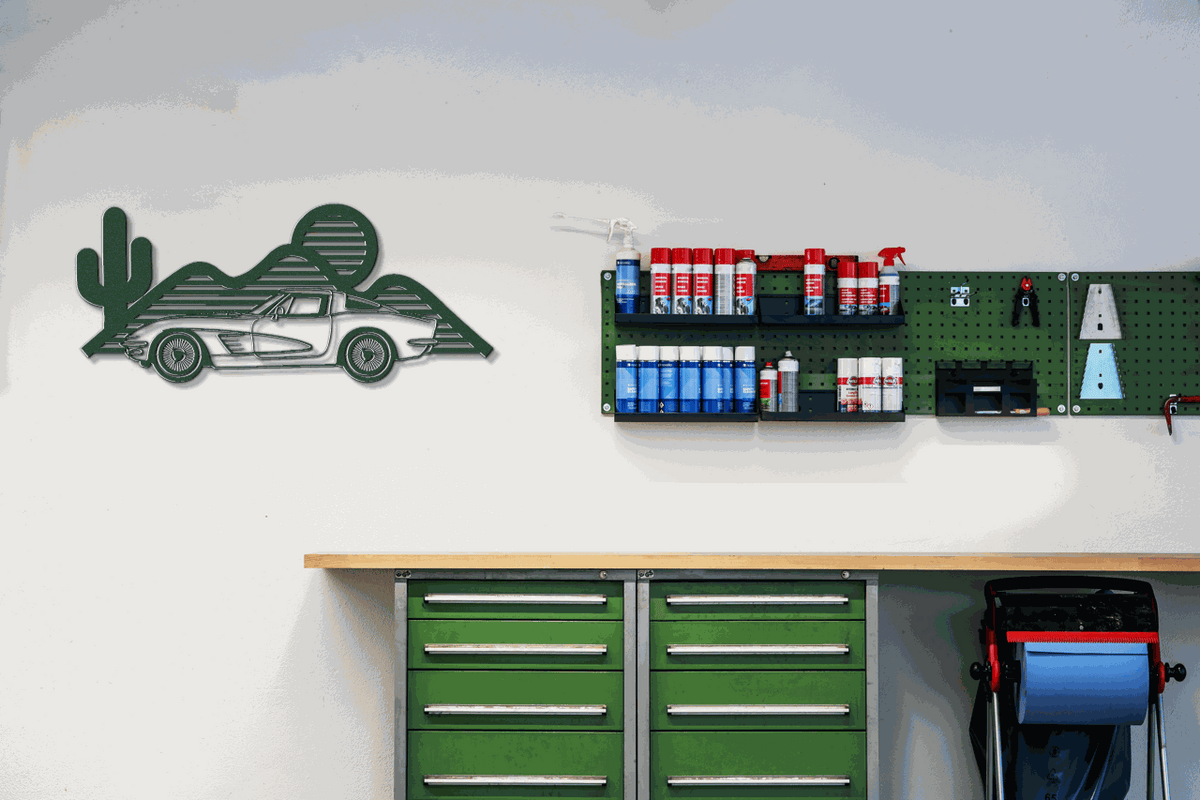 Laser-cut Corvette silhouette wall art in powder-coated steel, perfect for garages and man caves