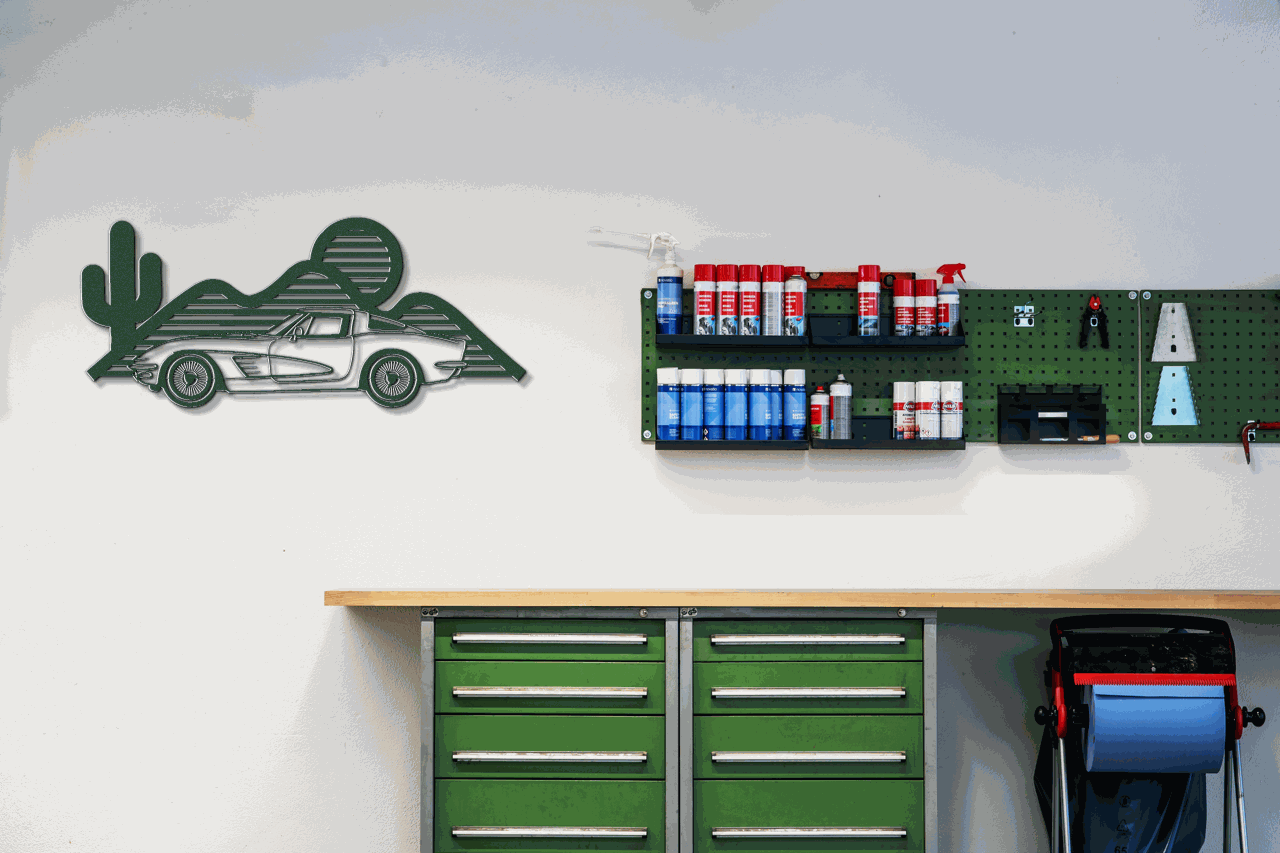 Laser-cut Corvette silhouette wall art in powder-coated steel, perfect for garages and man caves