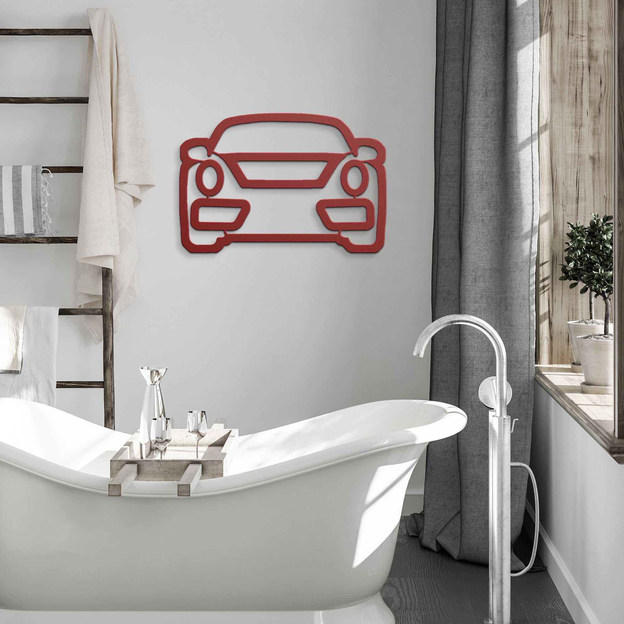 Red metal wall art in car shape hanging above bathtub in modern bathroom