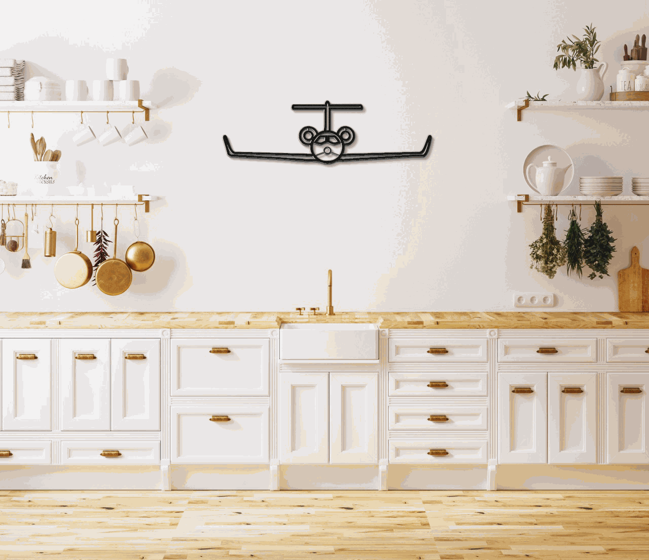 Modern kitchen decor with aviation-themed metal wall art silhouette of an airplane mounted above the sink