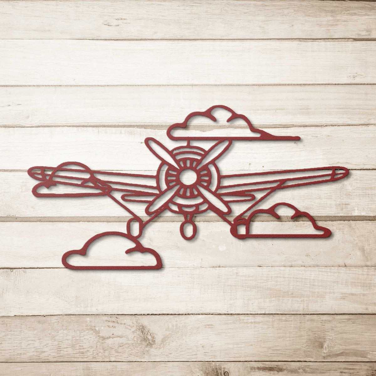 Vintage aviation metal wall art featuring laser-cut airplane propeller and clouds design in durable steel