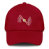 Red aviation hat with embroidered propeller design and adjustable strap
