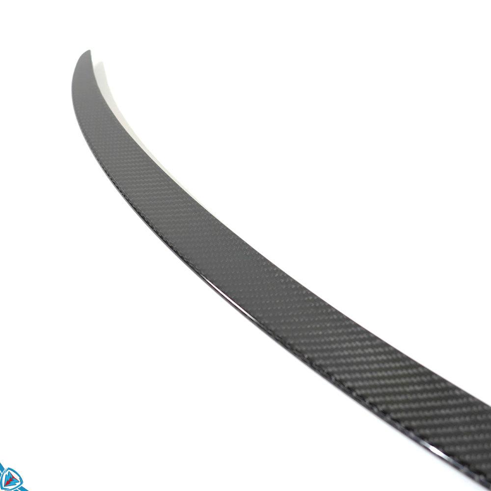 White Tesla Model Y with FYBR genuine carbon fiber performance style trunk spoiler