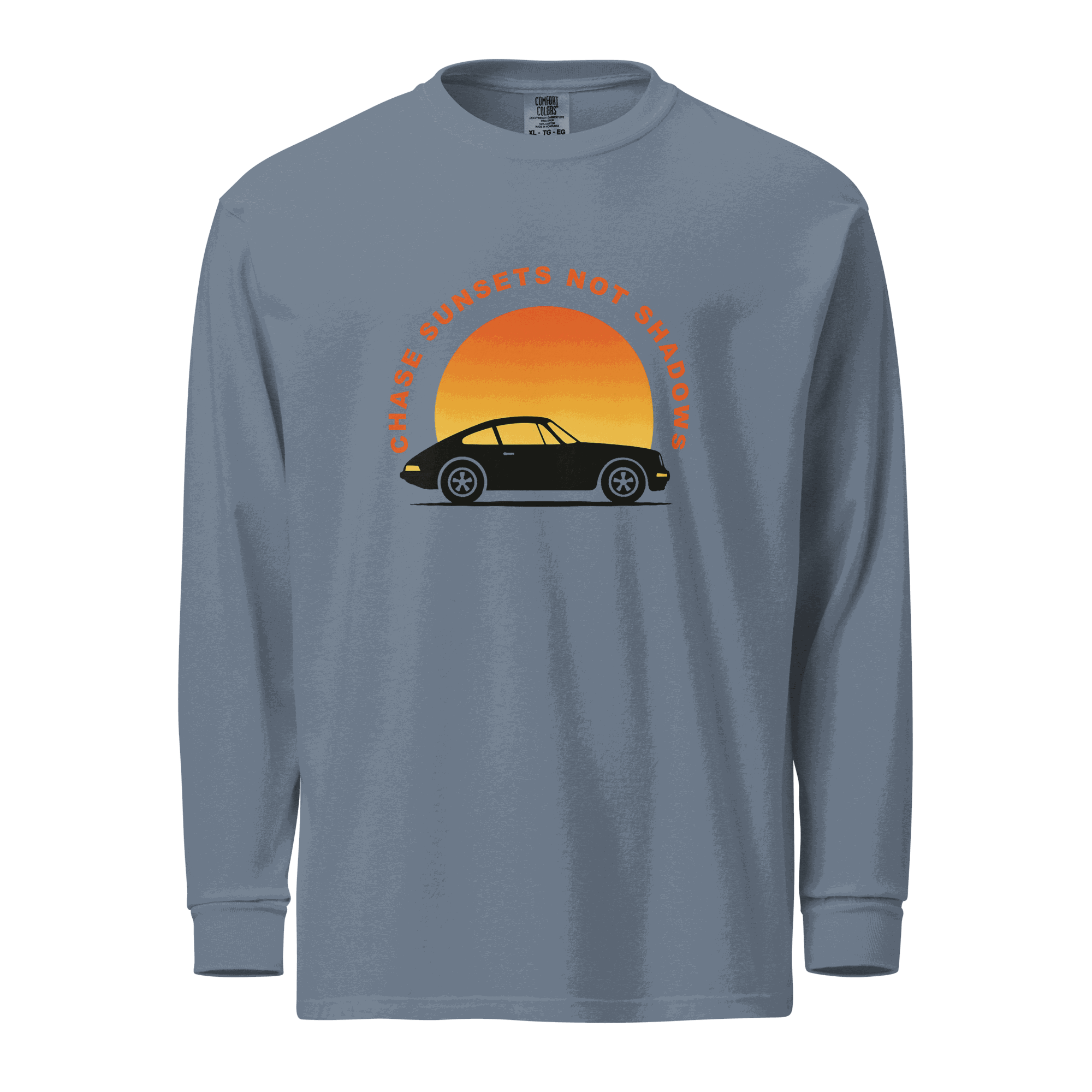 Garment-dyed long sleeve shirt with vintage car and sunset graphic on blue heavyweight cotton fabric