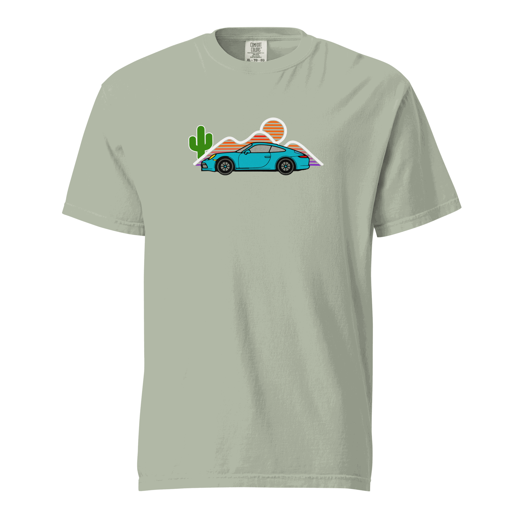 Green t-shirt with a sports car sunset graphic featuring a blue car, cactus, mountains, and setting sun.