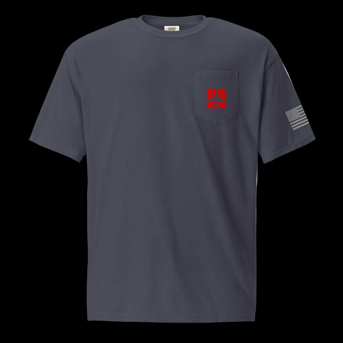 Gray t-shirt with a red and white logo on the chest pocket and a flag design on the sleeve against a white background.