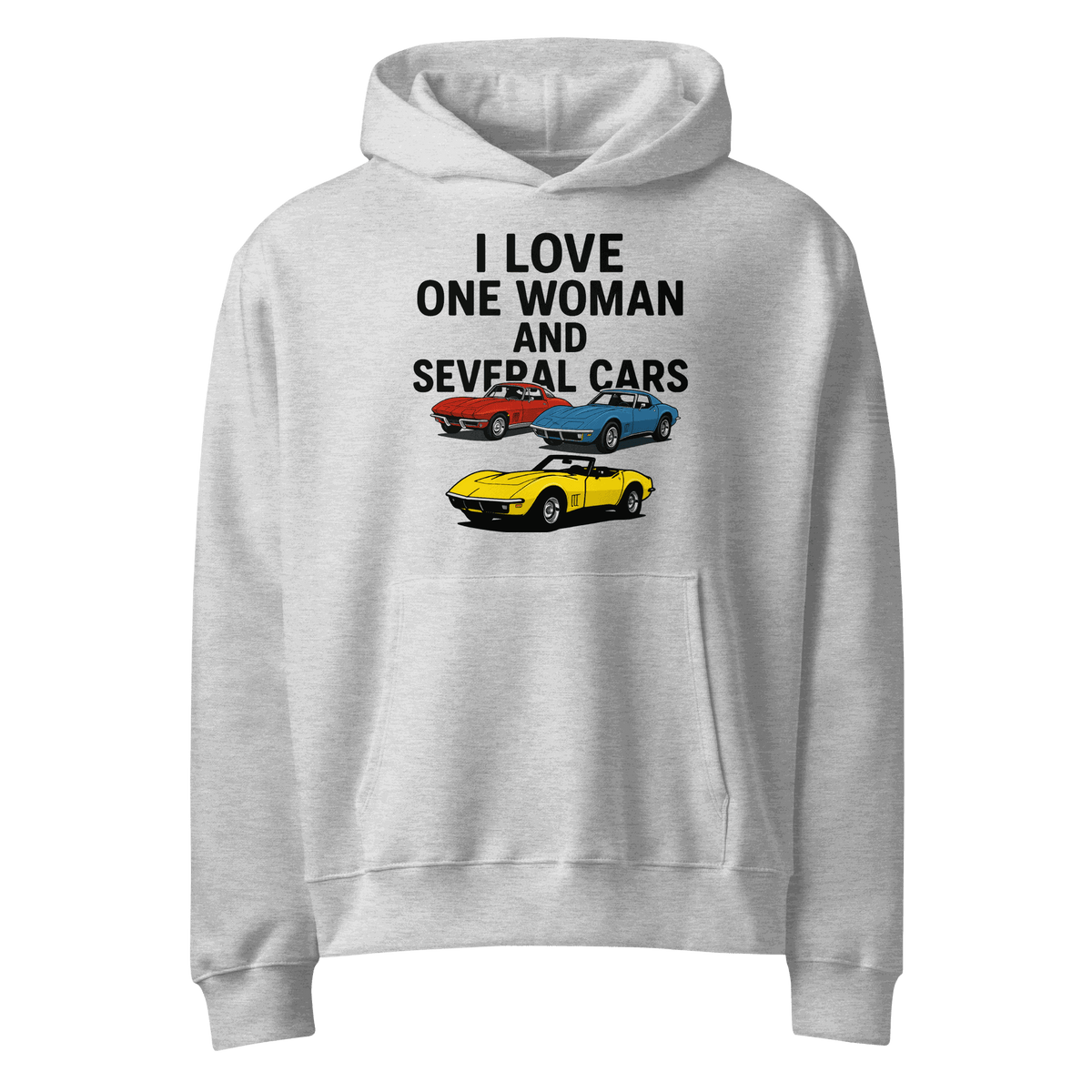 Oversized heavyweight hoodie worn by woman standing near several cars outdoors