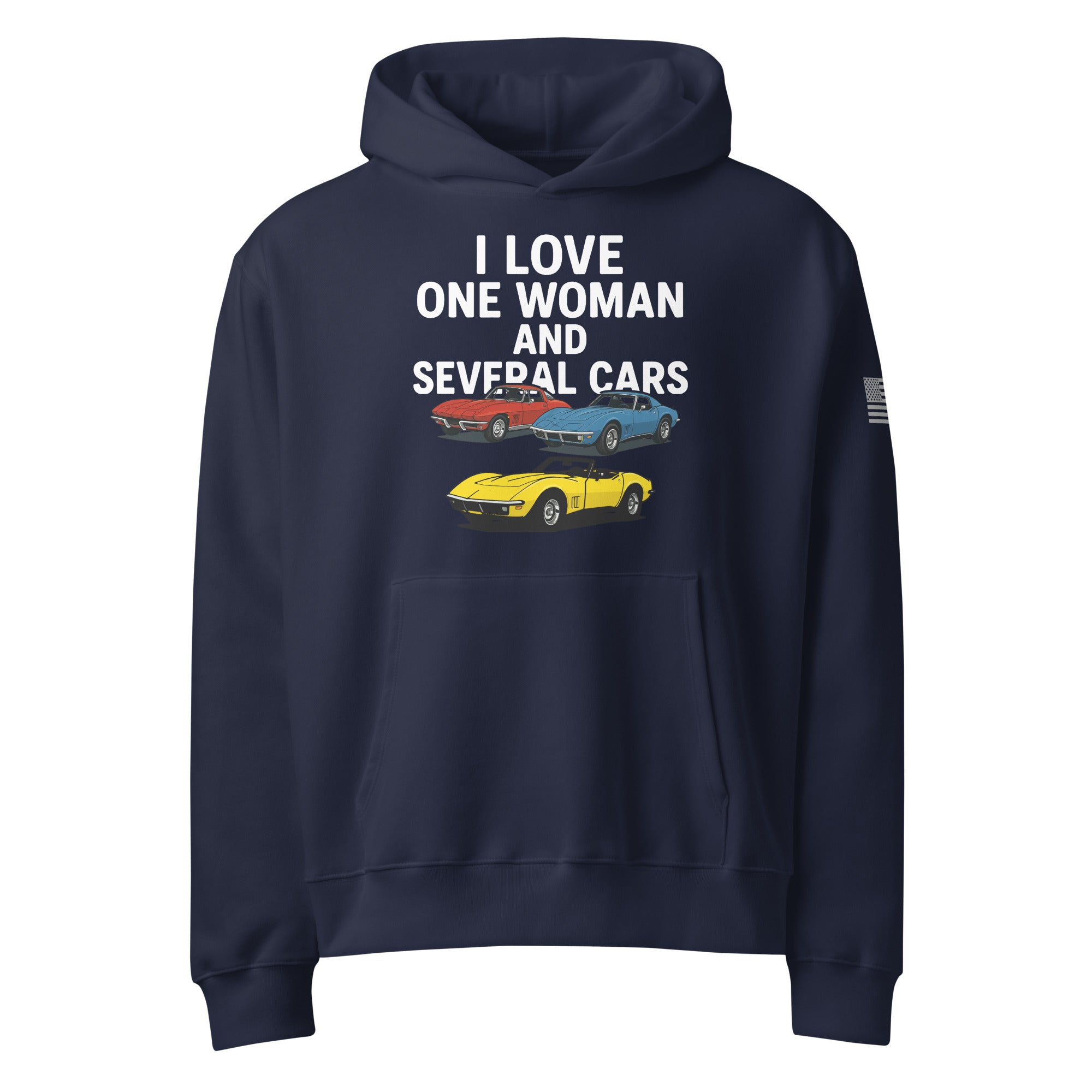 oversized heavyweight hoodie with ‘One Woman Several Cars’ text printed on the front — features a soft brushed fleece interior, double-layered hood without drawcords, front kangaroo pocket, and a roomy unisex fit — displayed in multiple color options.”