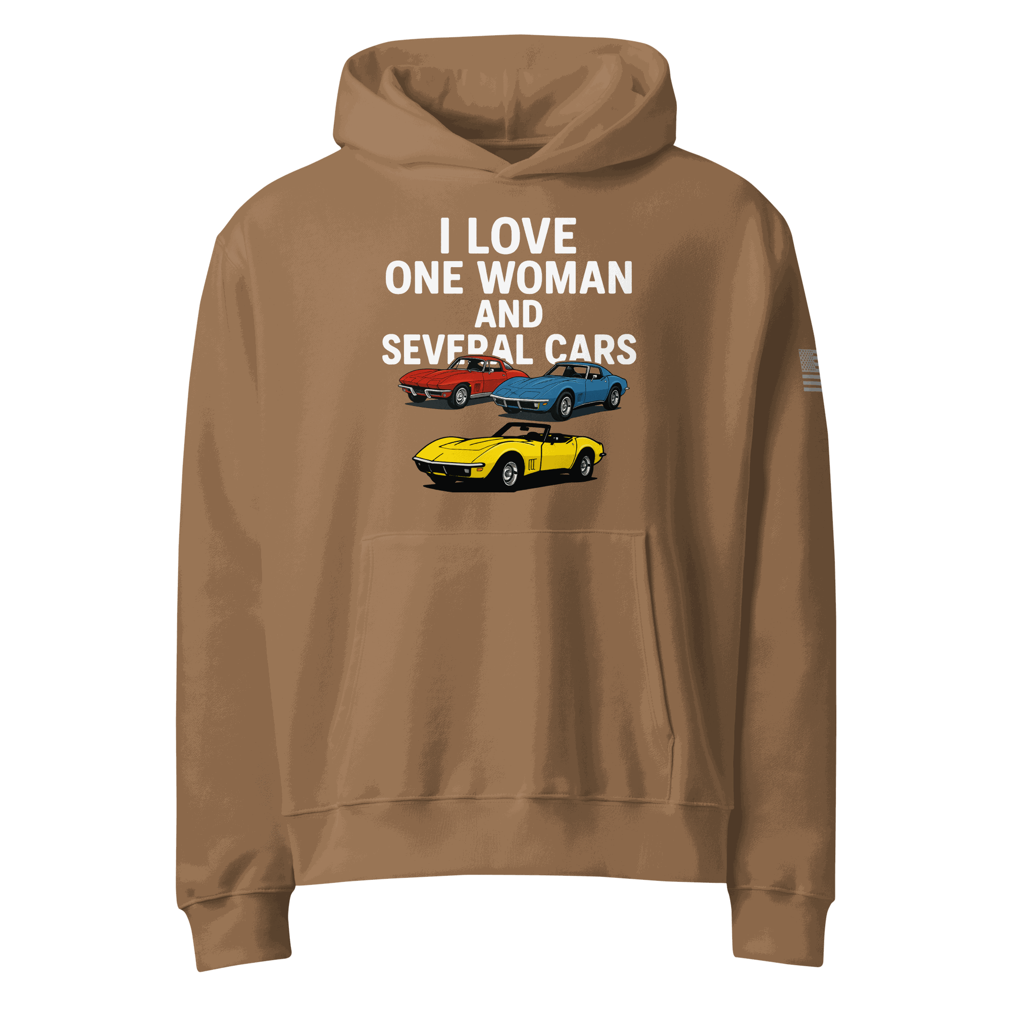 Woman wearing oversized heavyweight hoodie standing near several cars outdoors