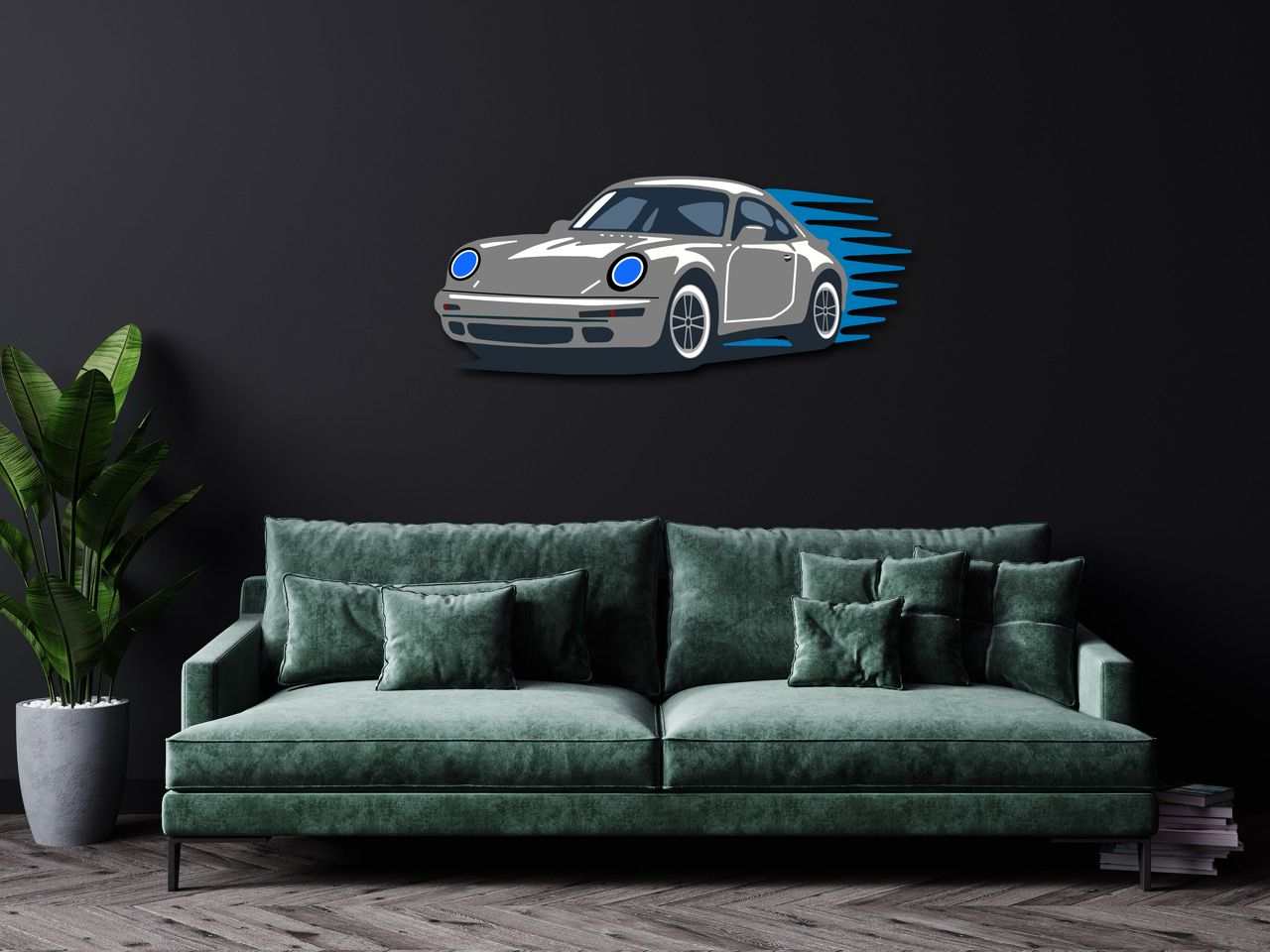 Garage wall decor steel art featuring a multicolor performance coupe silhouette mounted on a black wall above a green velvet sofa with decorative pillows and a potted plant nearby