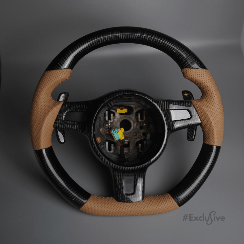 Porsche steering wheel 2009-2016 designed for models like 911, GT3, Boxster, Cayman, Cayenne, and Panamera.