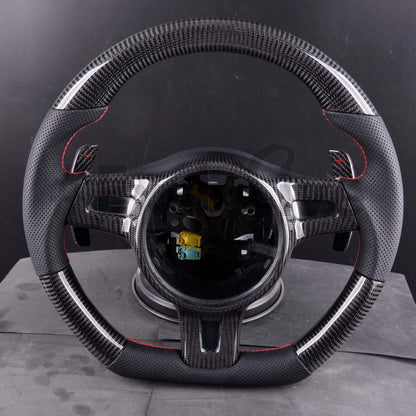 Porsche steering wheel 2009-2016 featuring carbon fiber texture and sleek design, perfect for 911, GT3, Boxster, Cayman, Cayenne, and Panamera.