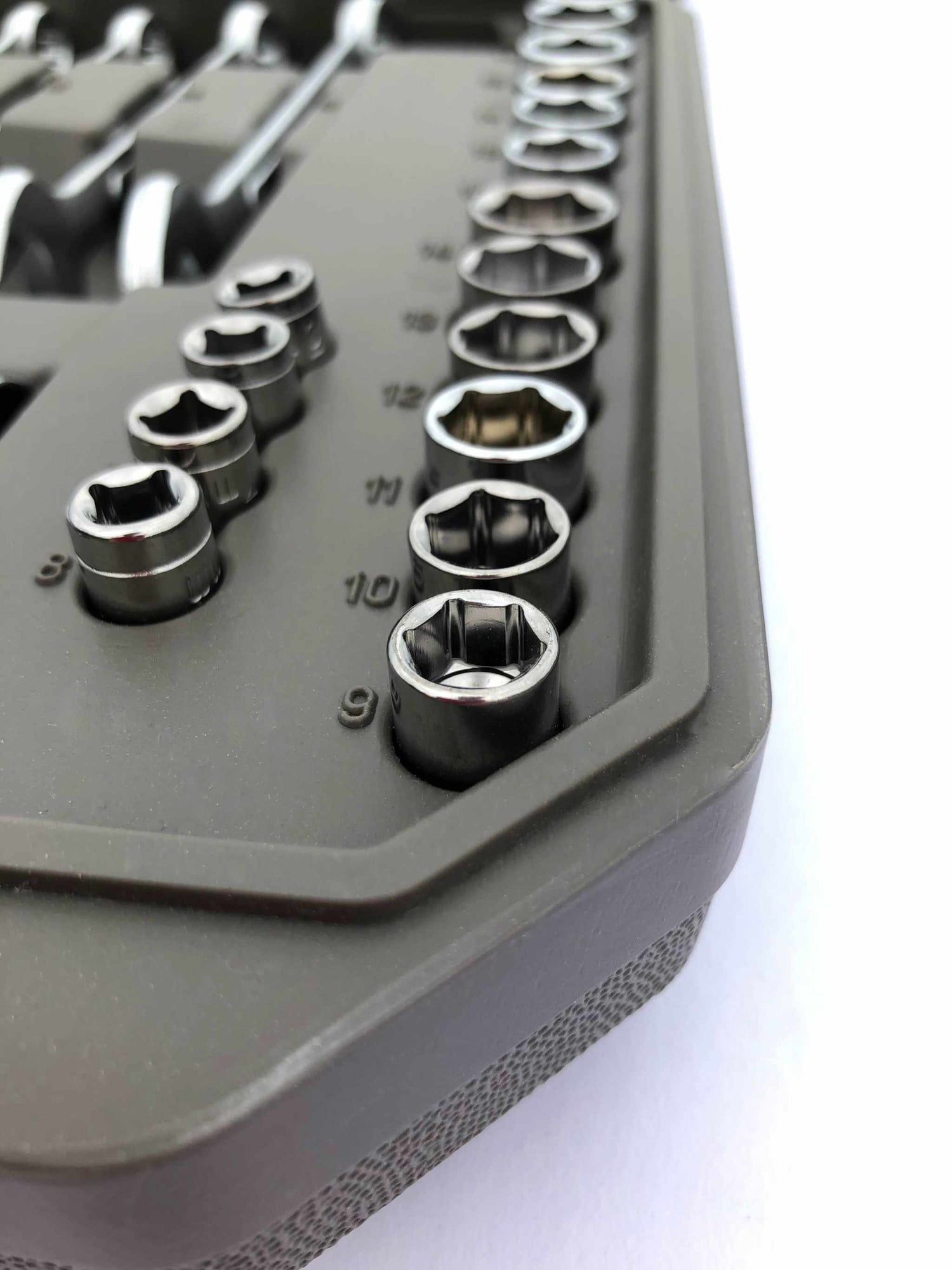 Close-up of socket tools organized in a compact mechanics tool set case