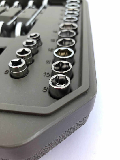 Close-up of socket tools organized in a compact mechanics tool set case