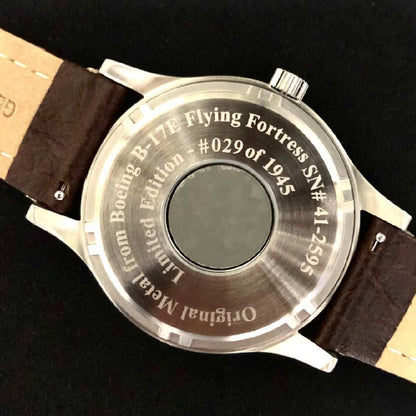 B-17 Flying Fortress tribute watch stainless steel case back with original airframe artifact and brown leather strap