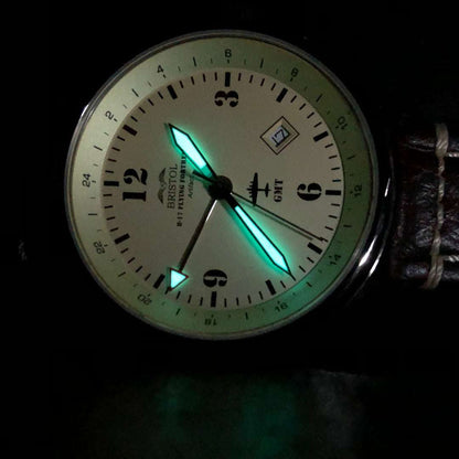 B-17 Flying Fortress tribute watch with beige dial, luminescent hands, polished stainless steel case, and brown leather strap with stitching