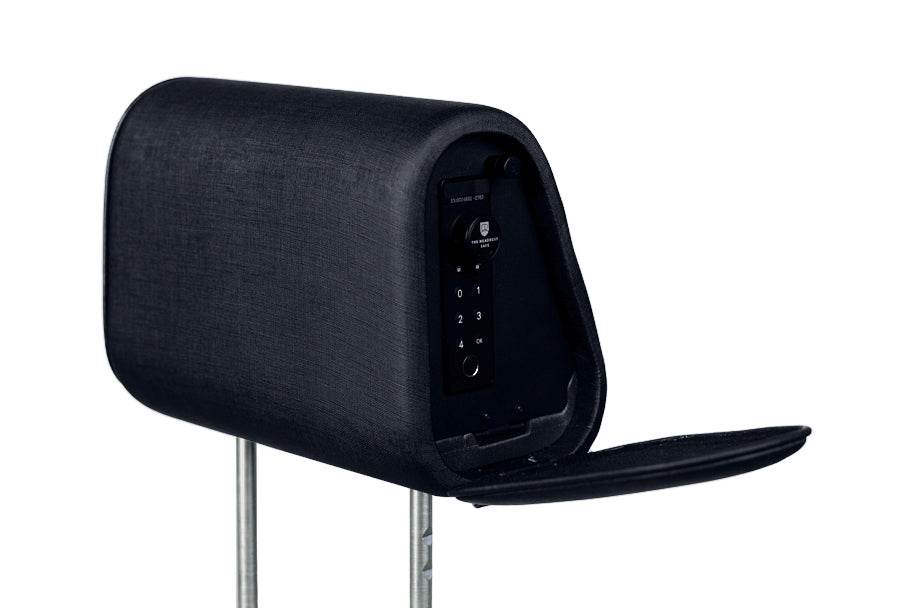 The Vulcan Headrest Safe steel safe with biometric lock for trucks and SUVs installed on headrest