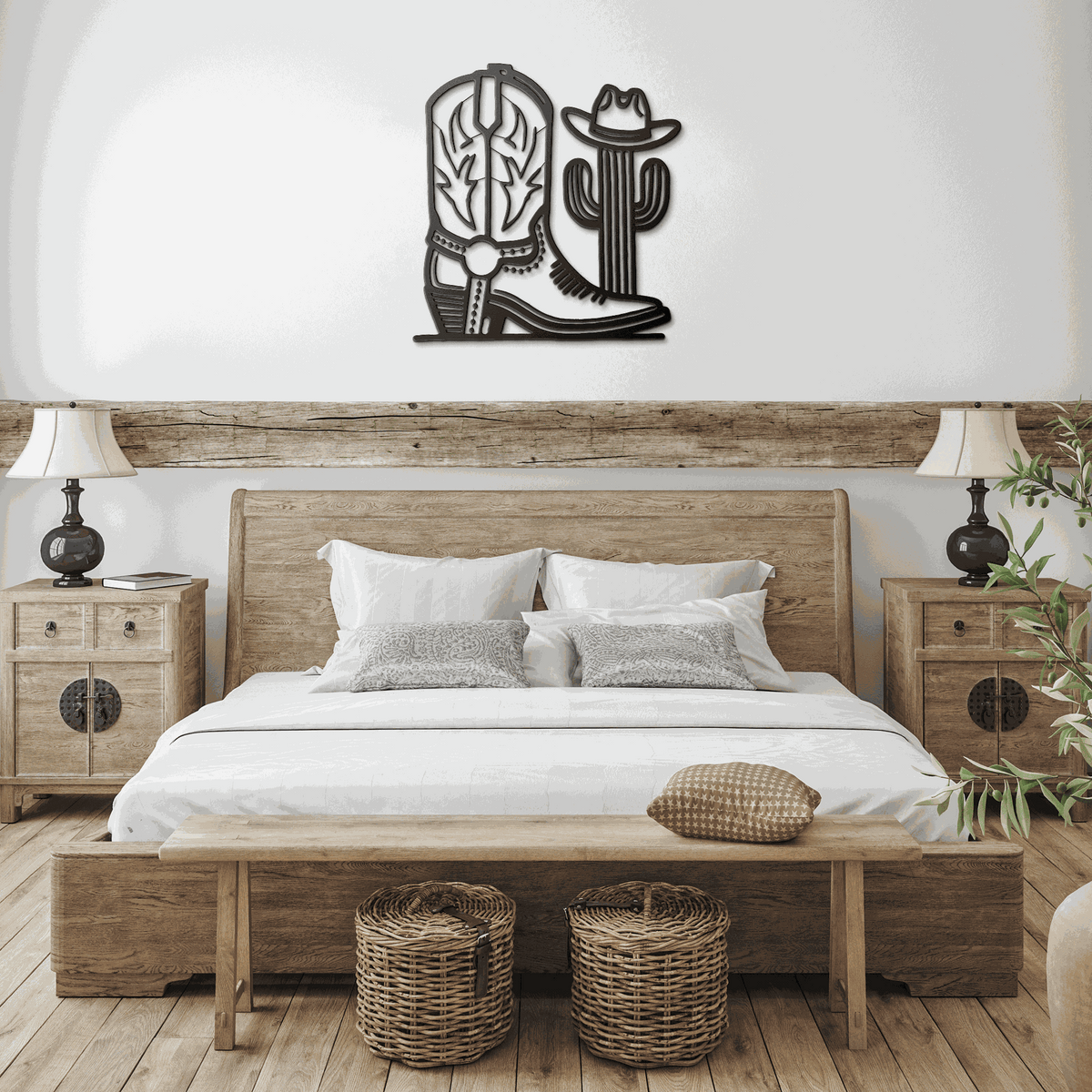 Metal wall art of cowboy boot and cactus in rustic bedroom with wooden furniture and decor