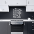Western metal wall art featuring cowboy boot and cactus in modern kitchen backsplash decor