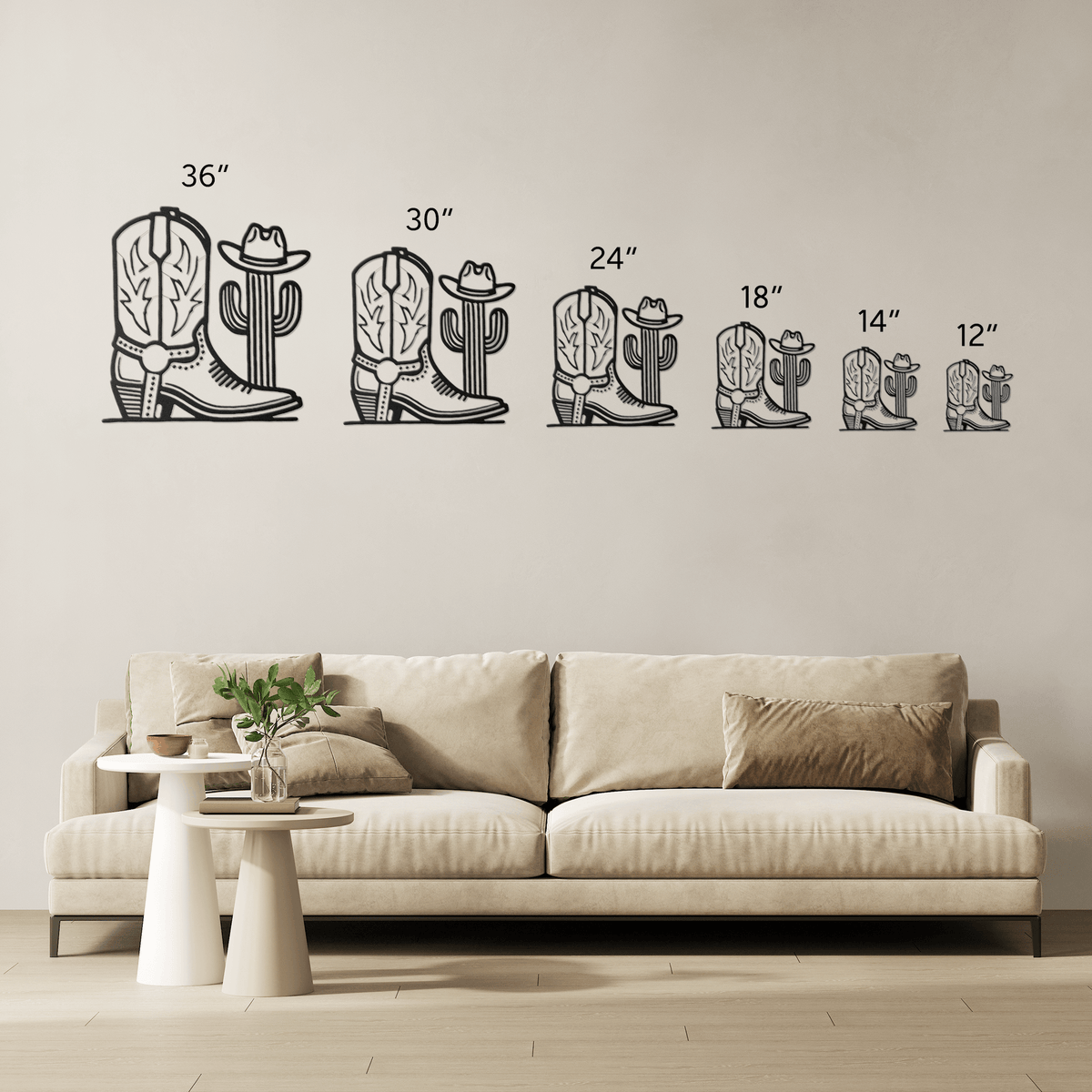 Cowboy boot and cactus metal wall art in six sizes displayed above a beige sofa in a modern living room