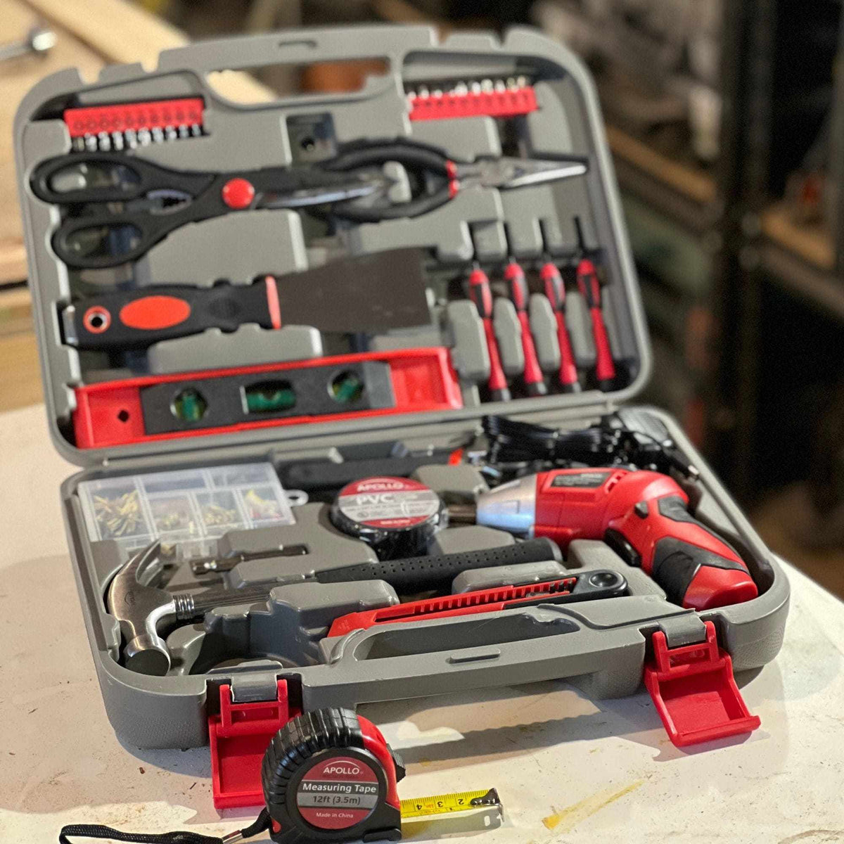 135 piece household tool set with pivoting dual-angle cordless screwdriver and assorted hand tools in carrying case