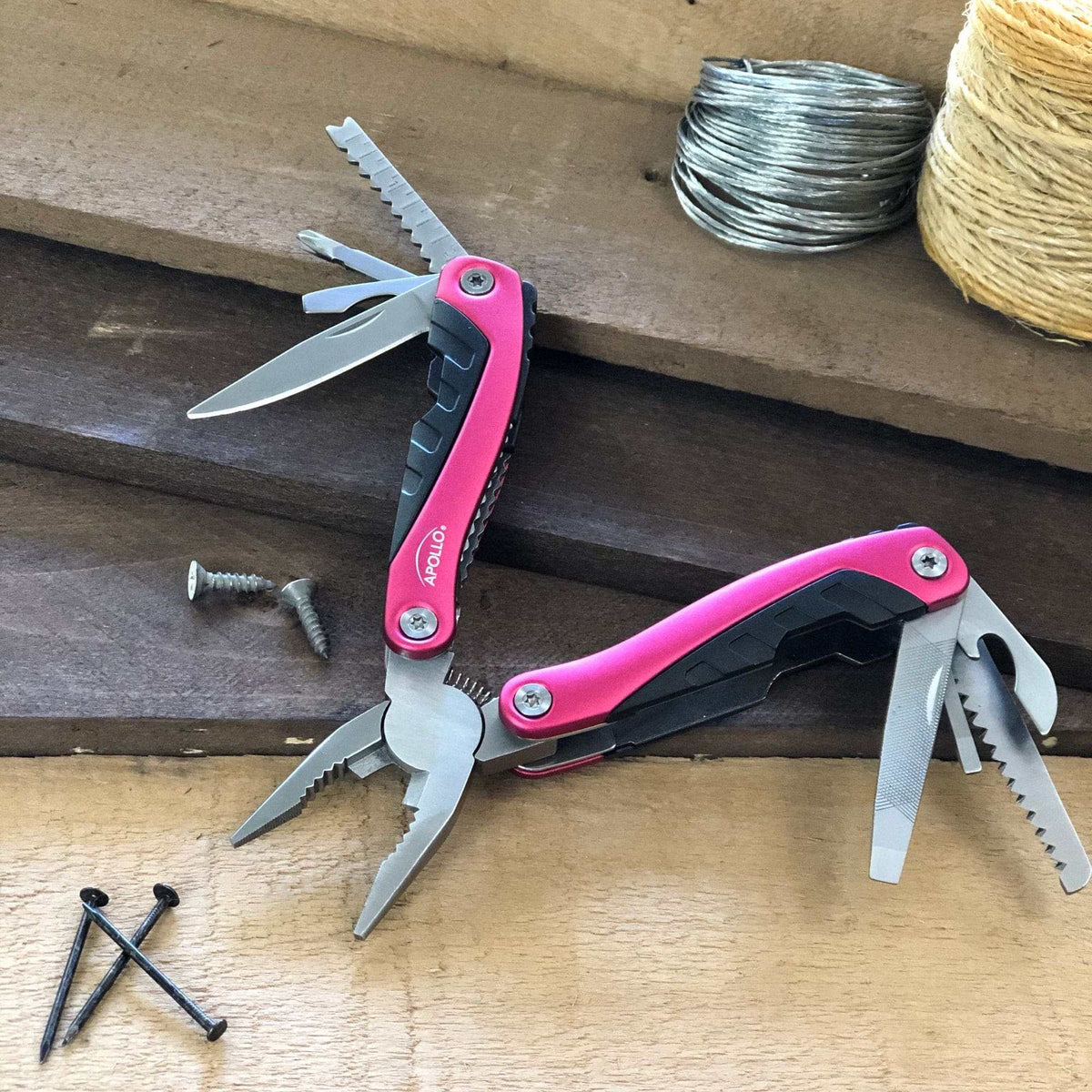 14-in-1 pink pocket multitool with pliers, knife, screwdriver, bottle opener, and fish scaler for outdoor and everyday use