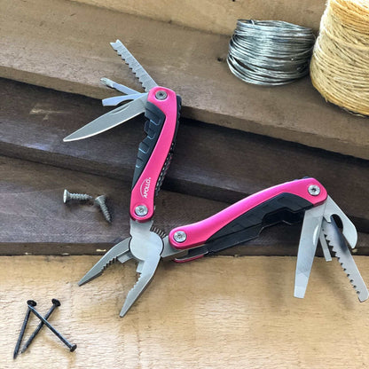 14-in-1 pink pocket multitool with pliers, knife, screwdriver, bottle opener, and fish scaler for outdoor and everyday use