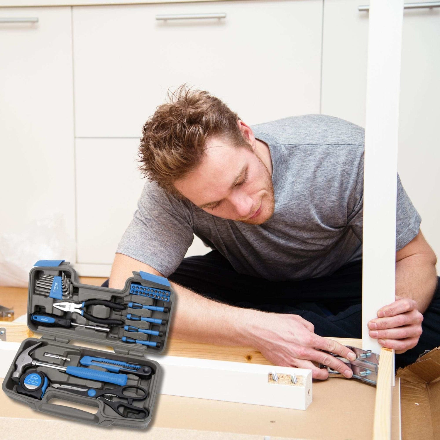 Compact 39-piece general tool kit with hammer, pliers, tape measure, utility knife, screwdrivers, hex keys, and storage case