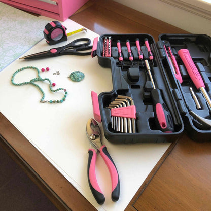 39 Piece General Tool Set pink with screwdrivers, pliers, hex keys, scissors, tape measure, and hammer in compact case for DIY repairs
