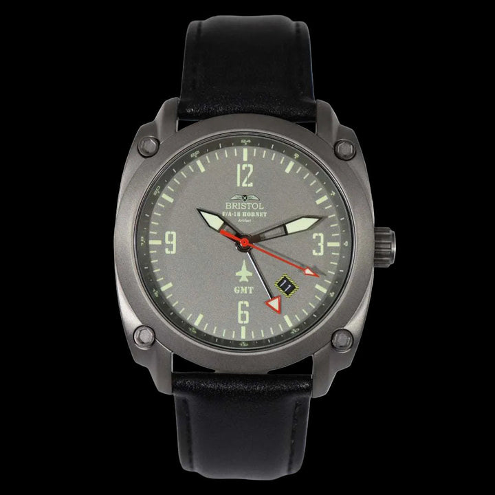 F-18 Hornet tribute watch with gunmetal case, gray dial, black leather strap, and GMT function