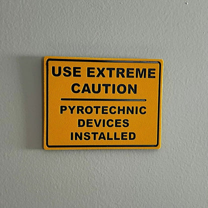 Pyrotechnic Devices Wall Sign with bold industrial warning, durable plastic, high-contrast lettering, easy mounting