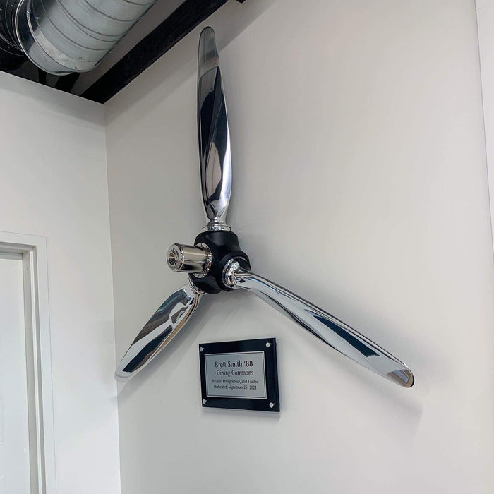 airplane propeller 3-bladed high polished McCauley aluminum metal airplane propeller wall sculpture with black hub and chrome snap rings