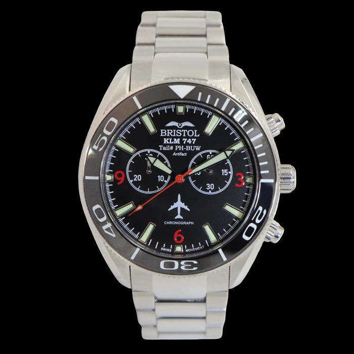 747 Tribute watch with stainless steel case, black dial, and KLM 747 airframe artifact