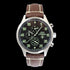 B-25 Mitchell tribute watch with stainless steel brushed case, black dial, and brown leather stitched band